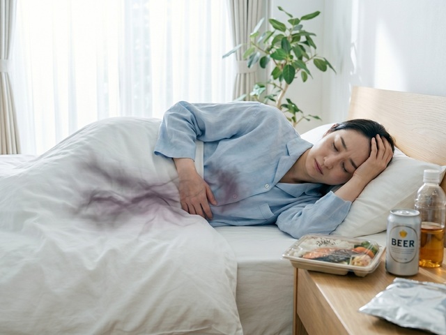 バランスの悪い食生活で、腸内環境が乱れて、体調を崩している人の様子。